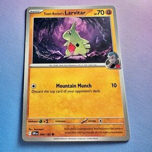 team rocket’s larvitar - 094/182 (common) — pokemon: destined rivals